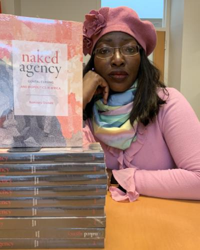 Professor Naminata Diabate with her book naked agency